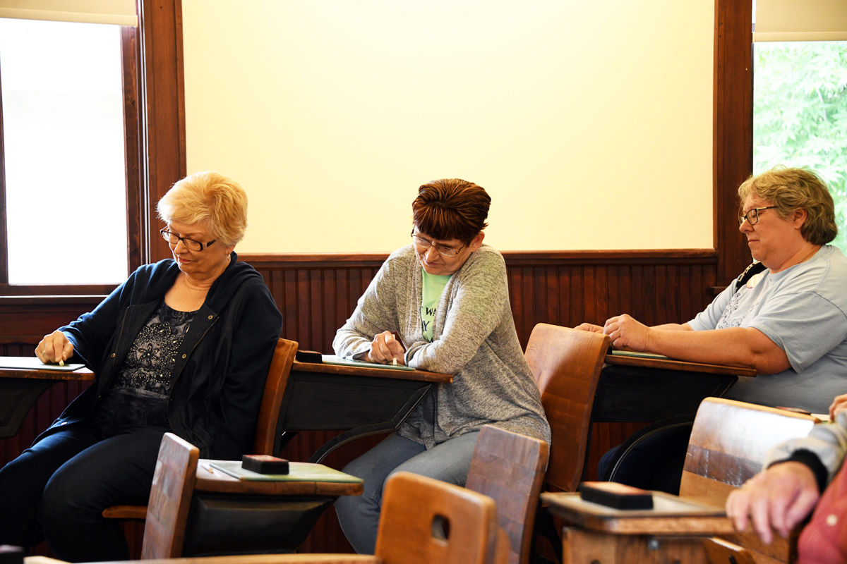 172 Ardee Rut, Doris Rogers and Rynee Spencer practice their penmanship in the 1950s schoolhouse.JPG